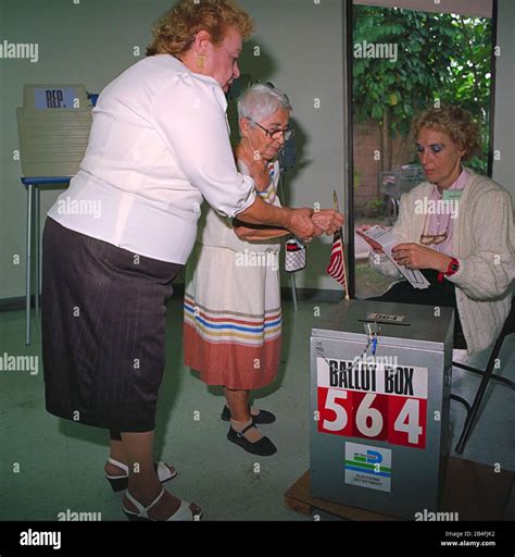 Elderly woman of Cuban descent voting in Miami during the presidential ...