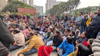 Staffers stage protest at court, hold peaceful vigil | Delhi News - The ...