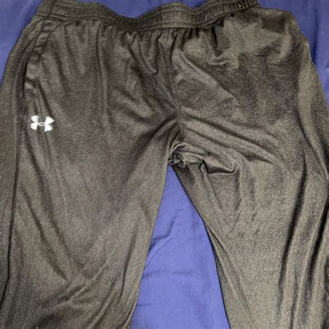 Dark grey under armor sweats Couple small holes - Depop