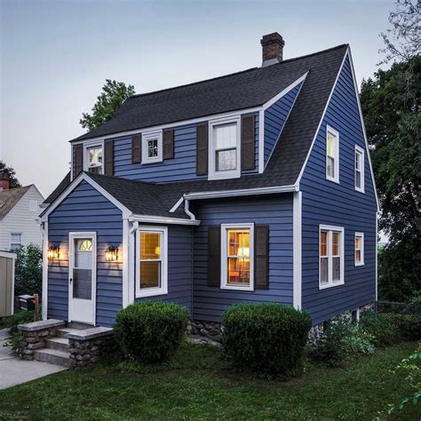 Dark Blue House With Shutters