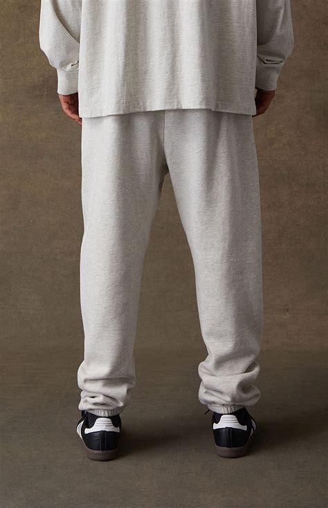 Fear of God Essentials Light Oatmeal Sweatpants | Pacsun
