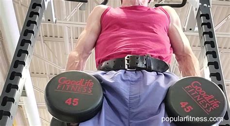 Shoulder Shrugs Exercise Using Dumbbells or the Smith Machine