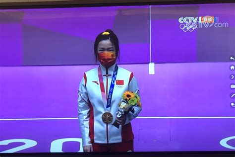 中国选手杨倩获得东京奥运会首枚金牌[组图] _ 图片中国_中国网