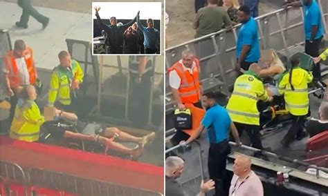 Heartbroken Oasis fans are wheeled out of gig on stretchers after splashing out on pricey tickets