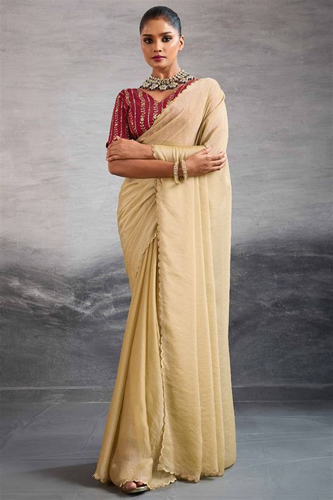 Cream Solid Organza Jimmy Choo Saree Accentuated With Elegant Cutwork