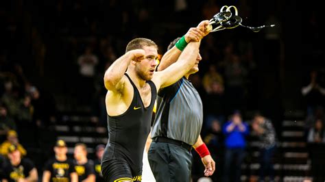 Iowa Hawkeye wrestlers muscle through an 18-13 win over Minnesota