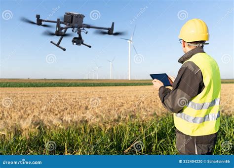 Engineer Controls Drone for Wind Turbines Inspection Stock Photo ...