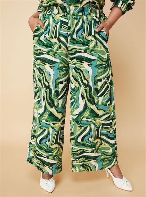 Buy Women Printed Wide-Leg Trousers Online at just Rs. 1199.0 ...