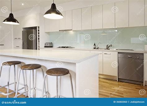 White Contemporary Kitchen with Island Stock Photo - Image of home ...