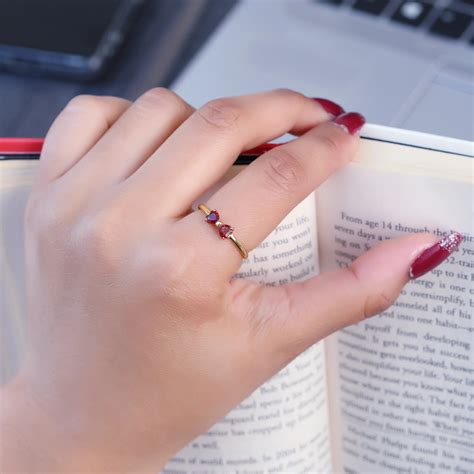 Bow Ring with Heart Shape Garnet Gemstones | Silver Eternity