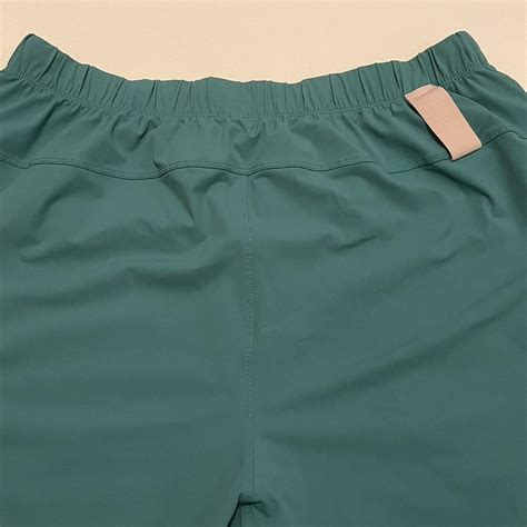 fabletics green and pink mens shorts #fabletics... | Depop