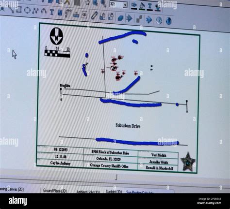 A diagram of the crime scene, entered into evidence, is seen during day ...