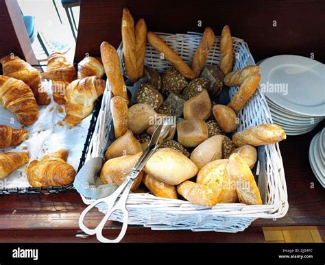 Delicious freshly baked bread in a basket during a breakfast buffet in ...