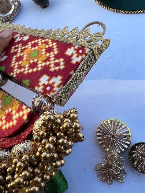 THE SLEEK: Maroon Navratna Patola and Inflorescence Divine Pichwai Cla ...