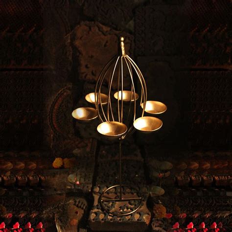Buy Eye-catching Golden Six Candle Tlight Holder Online in India ...