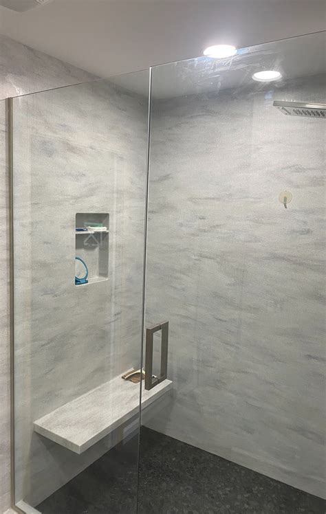Solid Surface Showers | Corian shower walls, Bathroom remodel shower ...