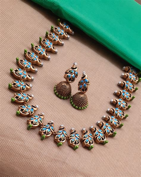 Antique Gold Toned Blue And Green Color Peacock Design Terracotta Chok ...