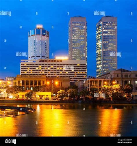 Colombo city skyline and Beira lake chanel at sunset. Colombo is the ...