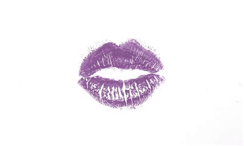 Premium Photo | Purple lipstick kiss mark isolated on white background