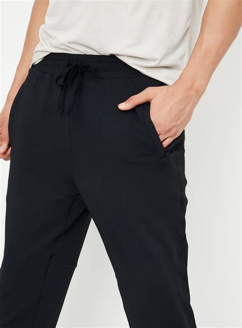 Buy Men Solid Track Pants Online at just Rs. 999.0 - 1000014875656 ...