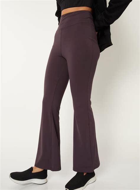 Buy Women Solid Flared Track Pants Online at just Rs. 999.0 ...