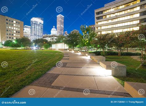 Illuminated Pathway Concrete Sidewalk At Park Square With Downtown ...