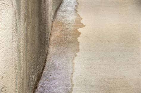 Why is water seeping through my basement floor? - Value Dry Waterproofing