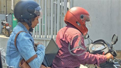 Bengaluru Woman Working While Riding Pillion Goes Viral » Car Blog India