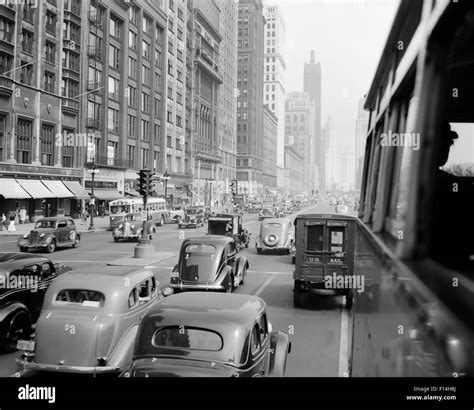 1930s MORNING TRAFFIC ON MICHIGAN AVENUE CHICAGO ILLINOIS USA Stock ...