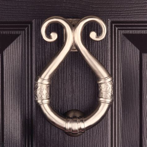 Silver Door Knockers by Adams & Mack