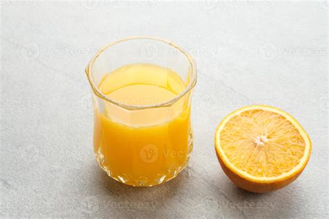 Orange juice in glass, cold pressed juice 13852818 Stock Photo at Vecteezy