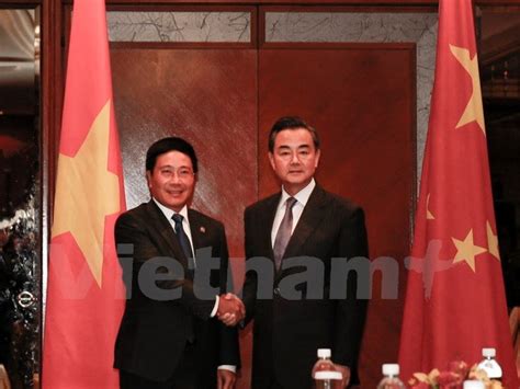 越南政府副总理兼外长范平明会见中国外交部长王毅
