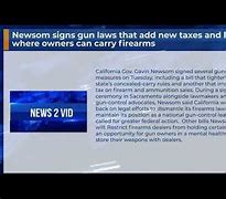 Image result for Newsom signs gun laws