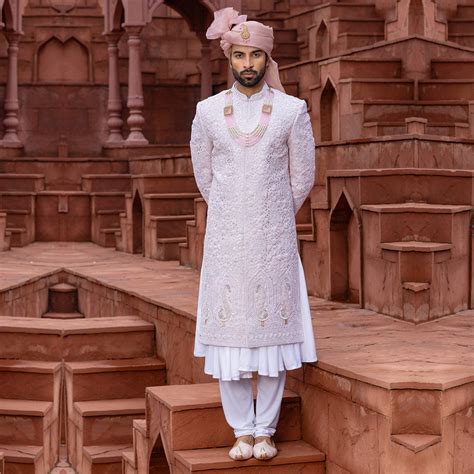 Rose Pink Sherwani with Intricate Artistry and Majestic Detailing ...