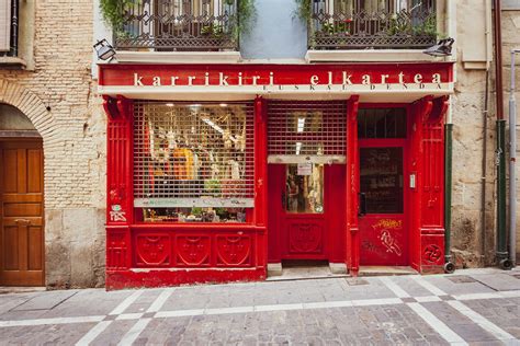 Red and white store front photo – Free Red Image on Unsplash