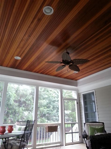 Great screened in porch with a tray ceiling and redwood tongue and ...
