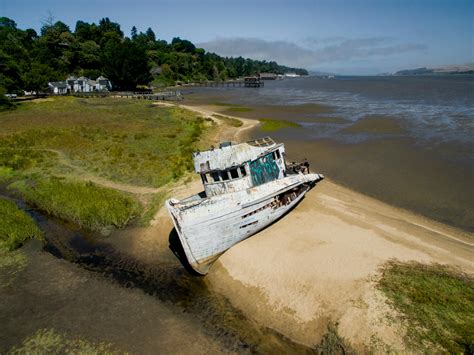 Abandoned Shipwreck at Point Reyes Shoreline · Free Stock Photo
