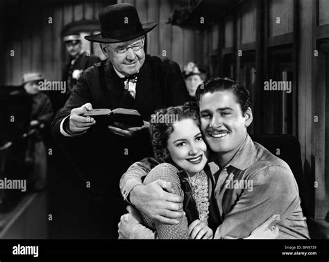 SPENCER CHARTERS, OLIVIA DE HAVILLAND, ERROL FLYNN, DODGE CITY, 1939 ...