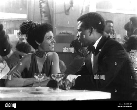 A WARM DECEMBER, Esther Anderson, Sidney Poitier, 1973 Stock Photo - Alamy