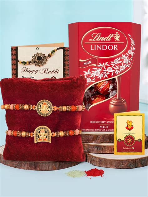 Buy | Divinity Antique Rudraksh Rakhi ( Set of 2) With Lindt Lindor ...