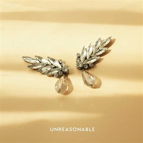 ต่างหูปีกนก Crystal ต่างหูคลิป ต่างหูก้านเงินแท้ UA0503-01 Unreasonable ...