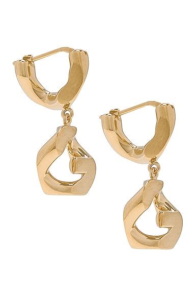 Givenchy G Pendant Earrings in Golden Yellow | FWRD