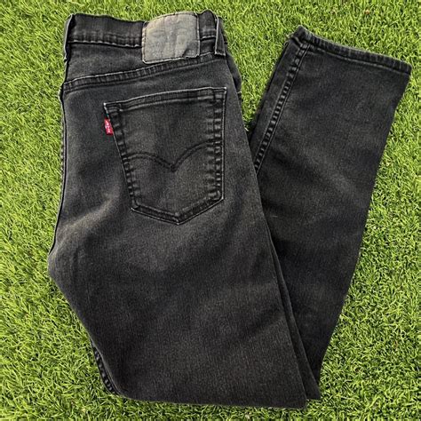 502 Levi’s black denim jeans size is 33W 32L men’s... - Depop