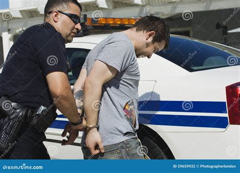 Officer Arresting Drug Dealer Stock Photo - Image of government ...