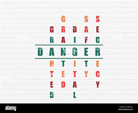 Protection concept: Danger in Crossword Puzzle Stock Photo - Alamy