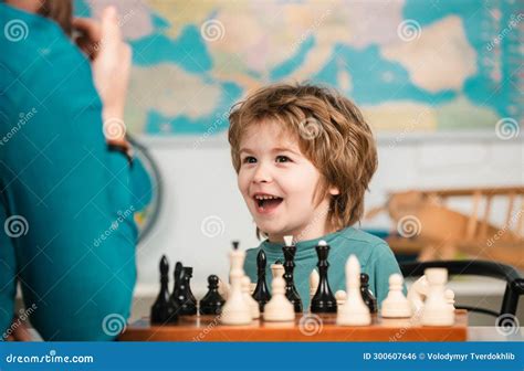 Child Chess School. Cheerful Smiling Little Boy Sitting at the Table ...