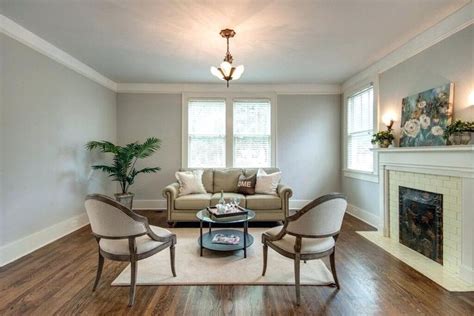 Image result for sherwin williams agreeable gray living room | Taupe living room, Fireplace surrounds, Taupe sofa living room