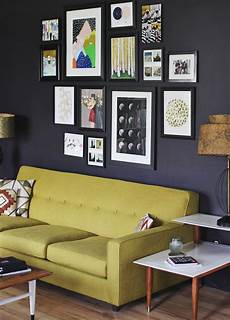 Living Room Pictures For The Walls by Create An Eye Catching Gallery Wall Living Room Pictures For The Walls