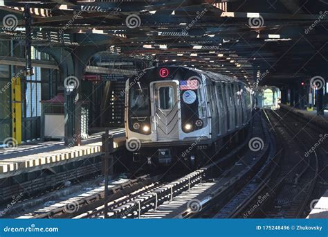 NYC Subway F Train Arrives at West 8 Street Station in Brooklyn ...