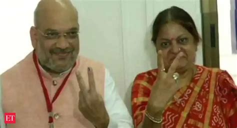 Amit Shah, wife Sonal Shah cast their votes at Naranpura polling booth ...